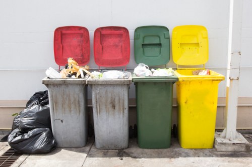 Residential home with organized waste containers in Southgate